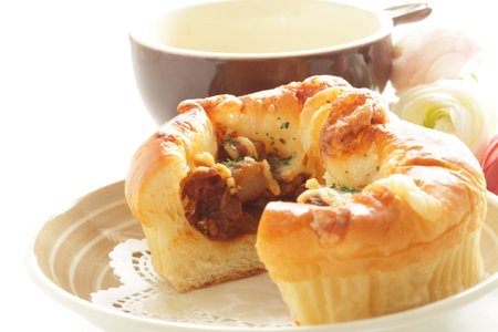 Homemade beef stew and cheese bun for breakfast