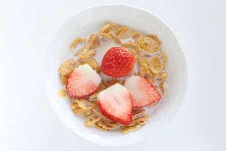 freshness sliced strawberries and corn flakesの写真素材