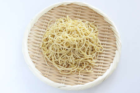 Chinese food, egg ramen noodles on bamboo basketの写真素材