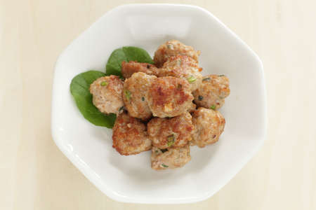 Homemade Chinese food, pork meat ball on lettuceの写真素材
