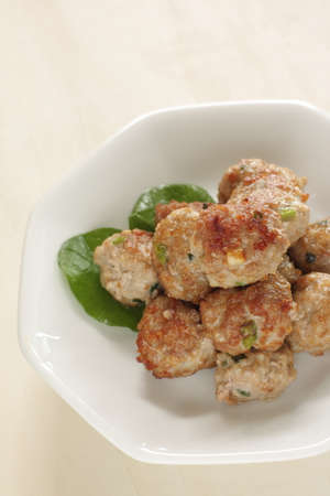 Homemade Chinese food, pork meat ball on lettuceの写真素材