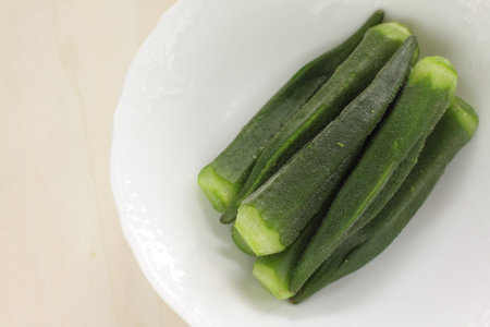 Homemade boil Okra for healthy salad with copy space