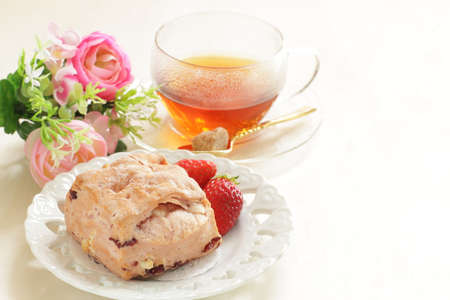 Homemade strawberry scone for spring breakfastの写真素材