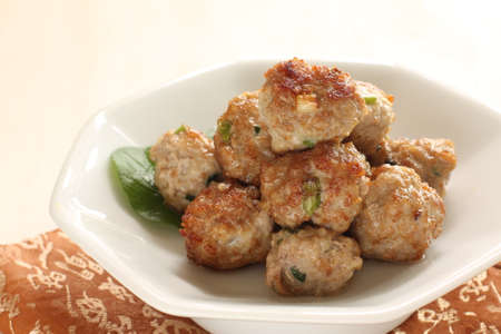 Homemade Chinese food, pork meat ball on lettuceの写真素材
