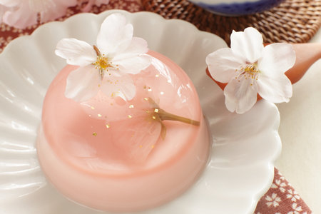 Edible cherry blossom jelly with gold dust for gourmet spring dessertの写真素材