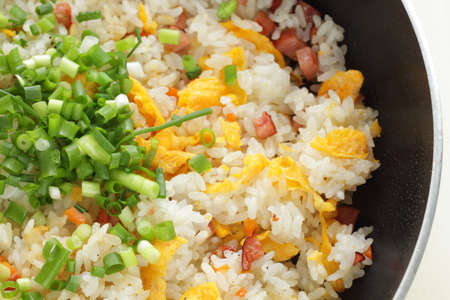 Cooking of roasted pork and egg fried rice by frying panの写真素材
