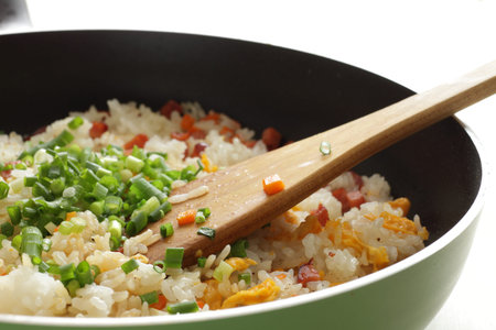 Cooking of roasted pork and egg fried rice by frying panの写真素材