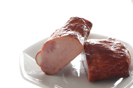 Chinese food, roasted pork halved on plate for gourmet comfort foodの写真素材