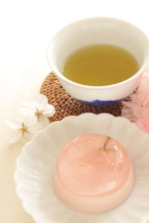 Edible cherry blossom jelly with gold dust for gourmet spring dessertの写真素材