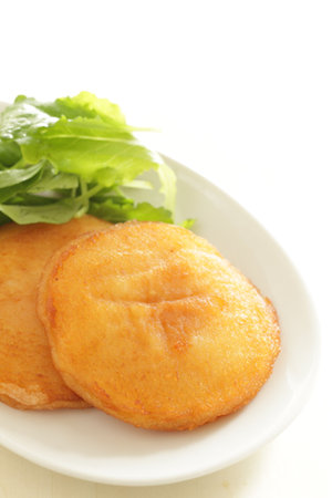 Asian street food, potato rice cake on dishの写真素材