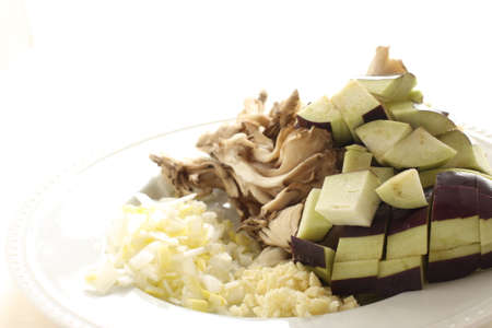chopped eggplant and Maitake Mushroom with minced scallion and garlicの写真素材