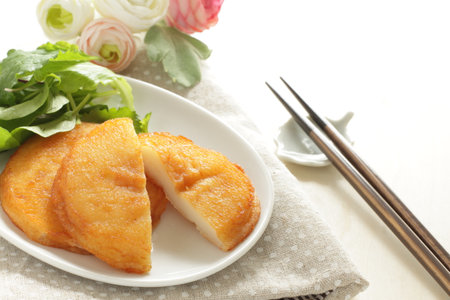 Asian street food, potato rice cake on dishの写真素材