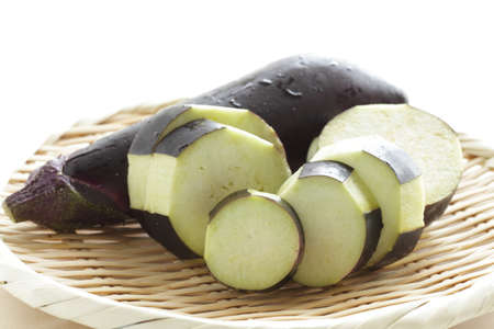 chopped Japanese eggplant on bamboo basket with copy space for cooking ingredientの写真素材
