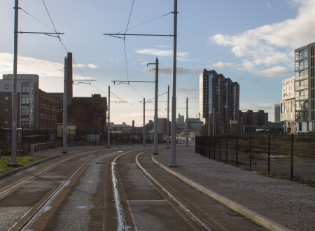 Metrolink tracks, residential buildings and chimneyのeditorial素材