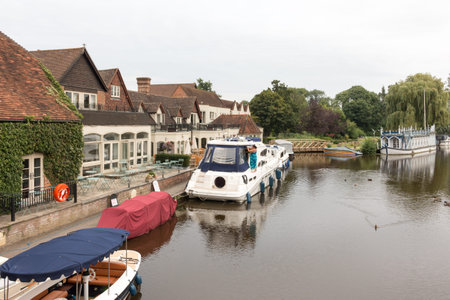The Swan, a hotel at the bank of River Thames. Streatley, Berkshire, England. Overcast weather.のeditorial素材