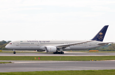 Saudia Boeing 787-9 wide-body passenger plane (HZ-ARA) taking off from Manchester International Airport runway.のeditorial素材