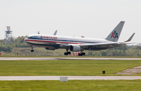 American Airlines Airbus A330 wide-body passenger plane (N362AA) landing to Manchester International Airport runway.のeditorial素材
