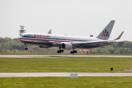 American Airlines Airbus A330 wide-body passenger plane (N362AA) landing to Manchester International Airport runway.のeditorial素材