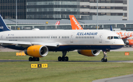 Icelandair Boeing 757-200 narrow-body passenger plane (TF-ISL) taxiing on Manchester International Airport tarmac.のeditorial素材