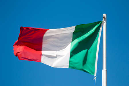Flag of Italy and a blue sky.の写真素材