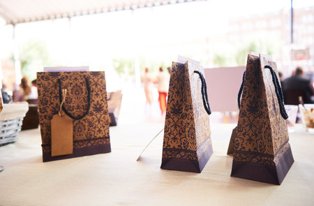 Gift bags on a table at a weddingの写真素材