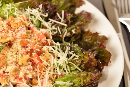 purple lettuce salad with quinoa and tomatoの写真素材