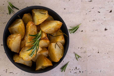 roasted potatoes with rosemary and spicy paprika.の写真素材