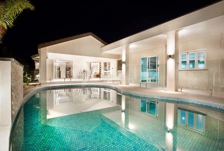 Luxury home with pool beside it  のeditorial素材