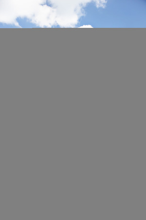 Sleeping chairs on sea side with sky, weather is clear, daytime scene with sunlight, sea area is shinning, perfect lighting of photo.の写真素材