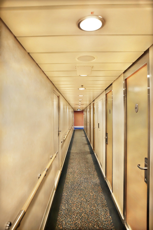 Luxury rooms in hotel  with modern facilities, walls are yellow color, colorful lamps on wall, evening time sceneの写真素材