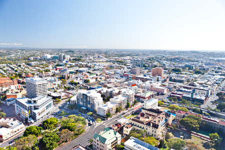 High angle view of lots of buildings and blue Skyscape with horizon from the distance of Brisbane City, Queensland, Australia.のeditorial素材