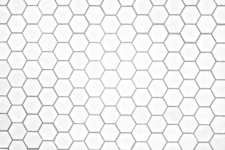 Honeycomb pattern from bees like a ceiling or wall with shape of heptagon on a white background,...