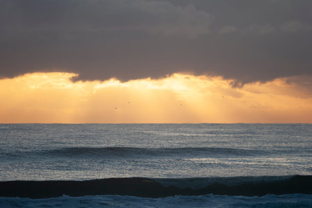 Sunrise over the sea horizon in Burleigh Heads, Queensland, Australia