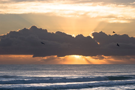 Sunrise over the sea horizon in Burleigh Heads, Queensland, Australia