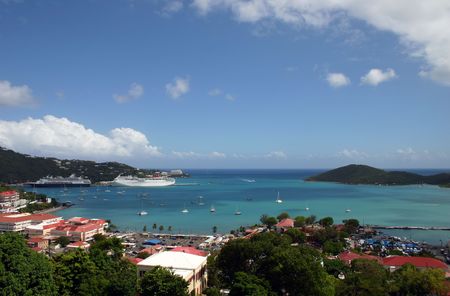 Cruise ships are docked at the port in St Thomas in the Caribbean on a beautiful sunny day. の写真素材