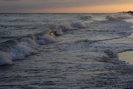 A nice shot of the receding breakers during sunset at Atlantic Beach North Carolina.の写真素材