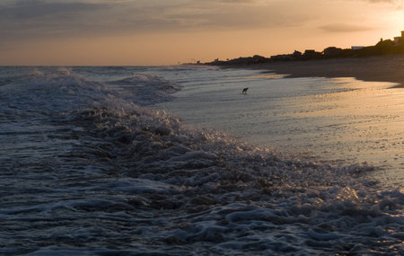 A nice shot of the receding breakers during sunset at Atlantic Beach North Carolina.