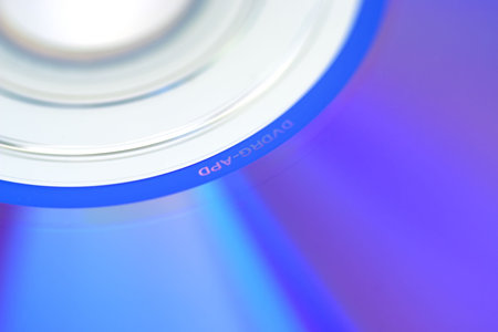 An abstract shot of a DVD suitable for use as a background.の写真素材