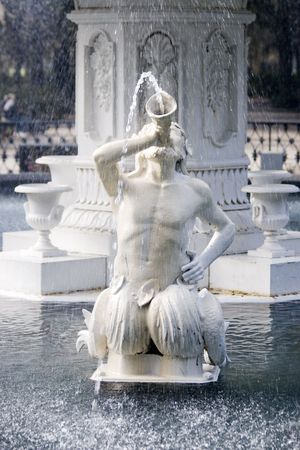 A sculpture in a fountain in Savannah.の写真素材