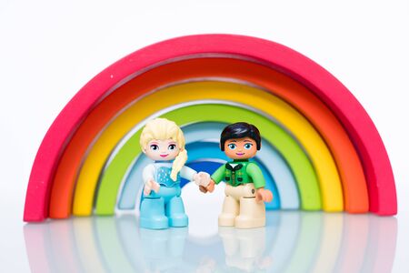 Gay pride flag on white background with dollsの写真素材