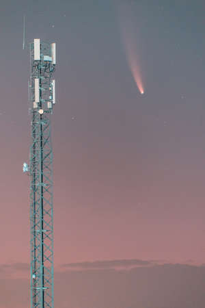 c / 2020 F3 Neowise comet near telecommunication towerの写真素材