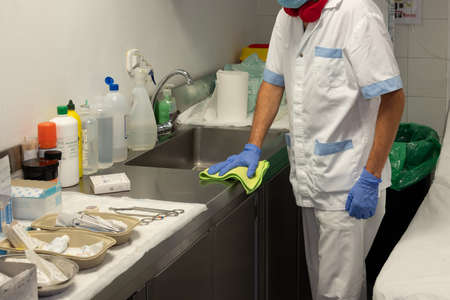Cleaning staff cleaning hospital roomsの写真素材
