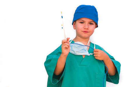 child dressed as a doctor. doctor-surgeon costume.の写真素材
