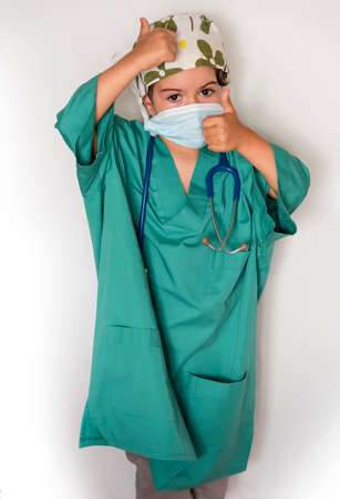 child dressed as a doctor. doctor-surgeon costume. child transplant.の写真素材