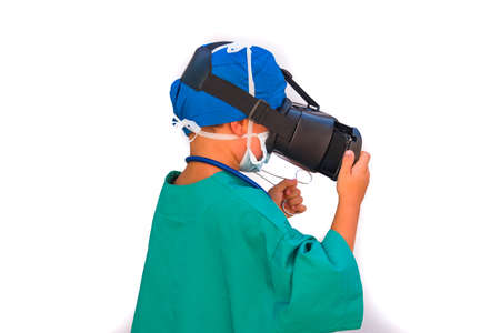 child dressed as a doctor with virtual reality glassesの写真素材