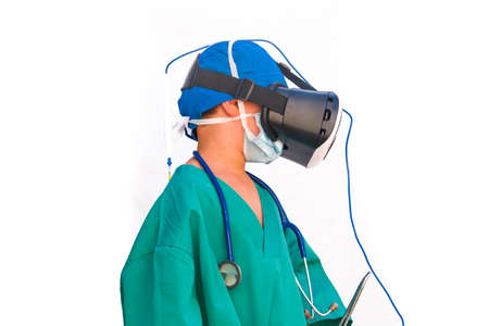 child dressed as a doctor with virtual reality glassesperson, 3d, ambulance, clinic, development, doctor, dream, dressed, education, emergency, emotional, first, game, glasses, hospital, job, kid, medical, medicine, nurse, occupation, pediatrician, physician, profession, professional, reality, smile, stethoscope, tools, uniform, virtual, health, looking, baby, care, caucasian, child, fun, little, one, portrait, roleの写真素材