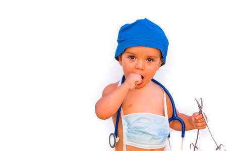 child dressed as a doctor. doctor-surgeon costume.の写真素材