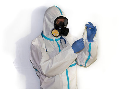 doctor with protective suit for covid19 with laboratory equipment. White background.