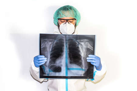 doctor with protective suit for covid19 with laboratory equipment. White background.の写真素材