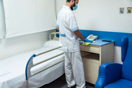 cleaning personnel carrying out disinfection and hygiene work on the premisesの写真素材